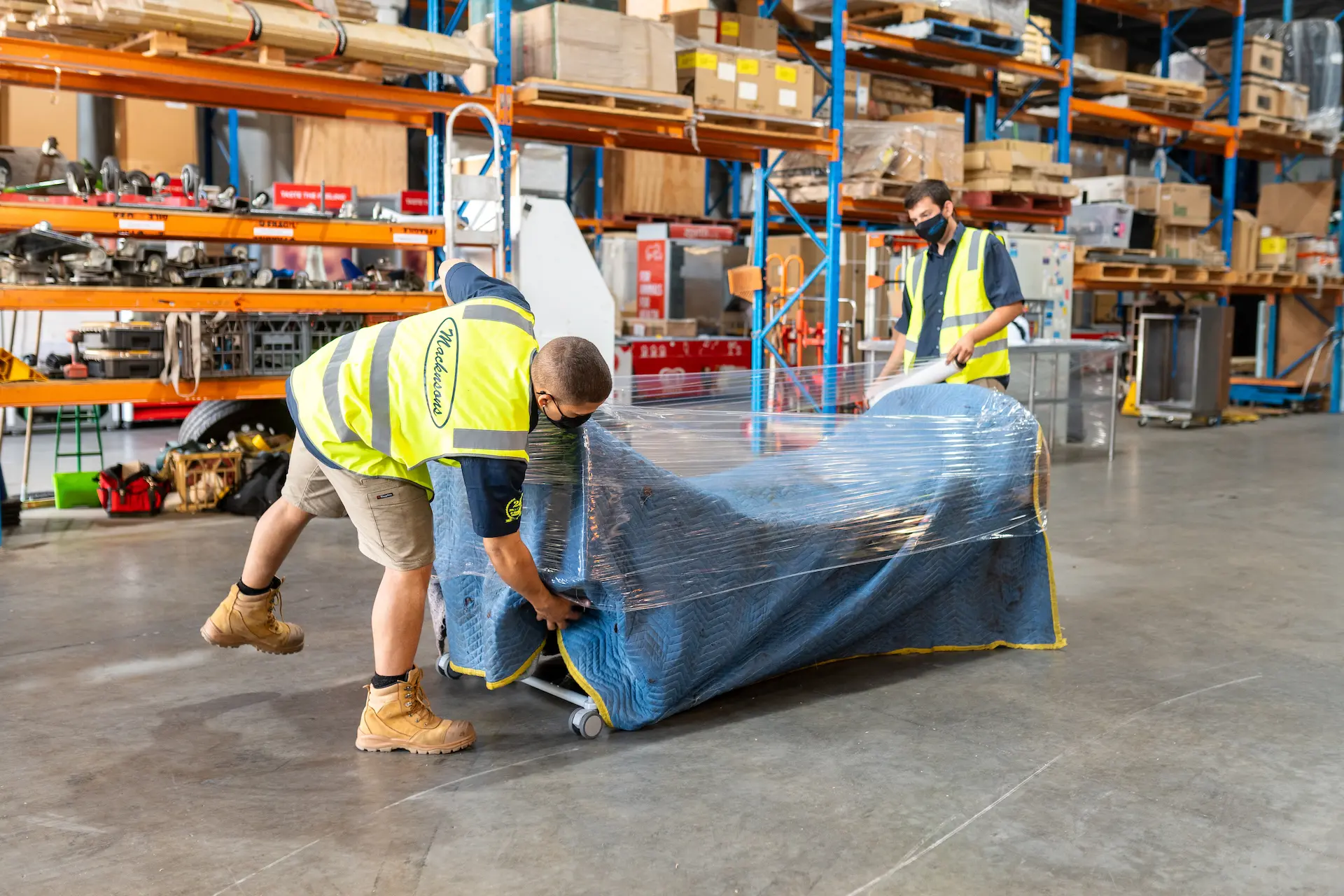Wrapping freight in protective plastic