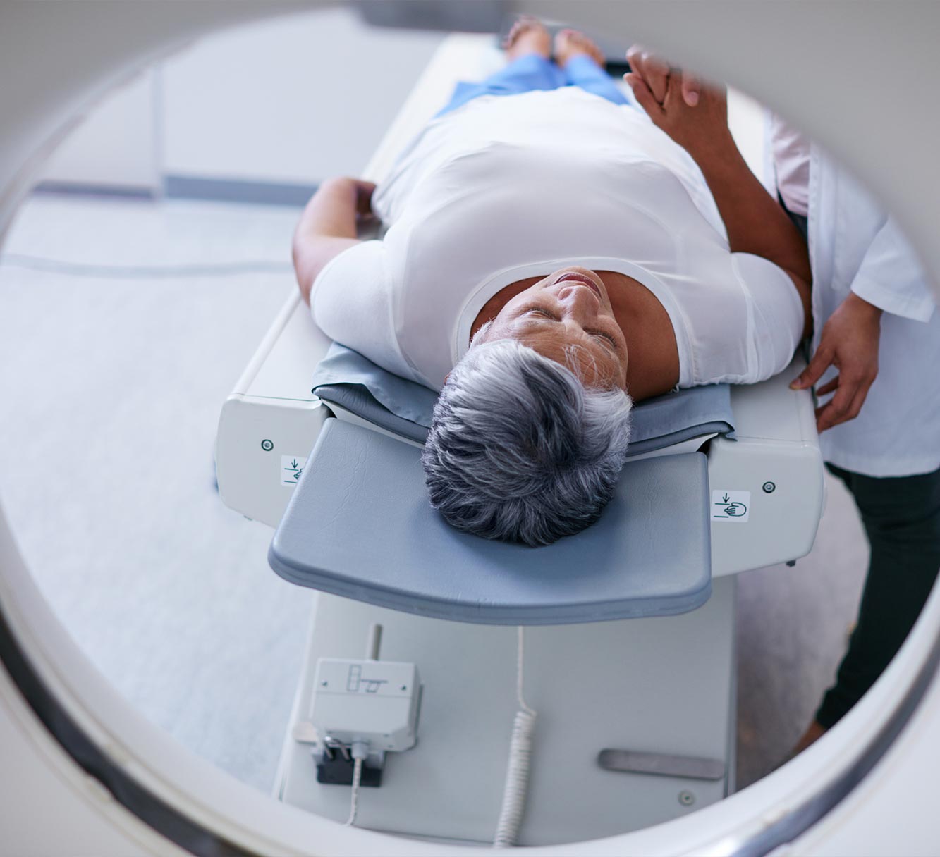 Person about to enter an MRI machine